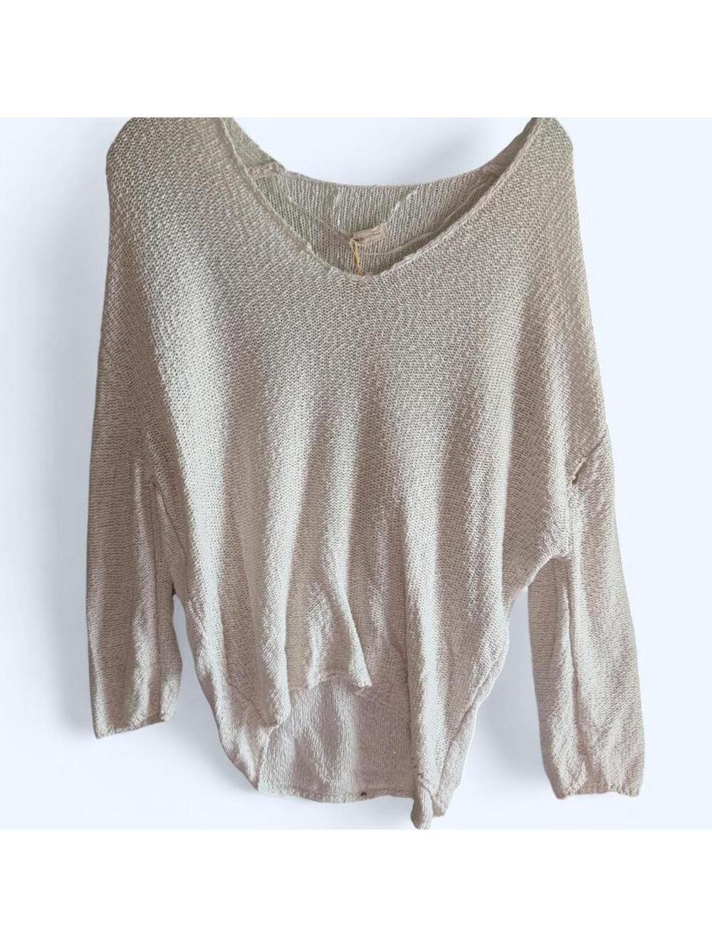 Urban Outfitters white knit sweater with a relaxed fit